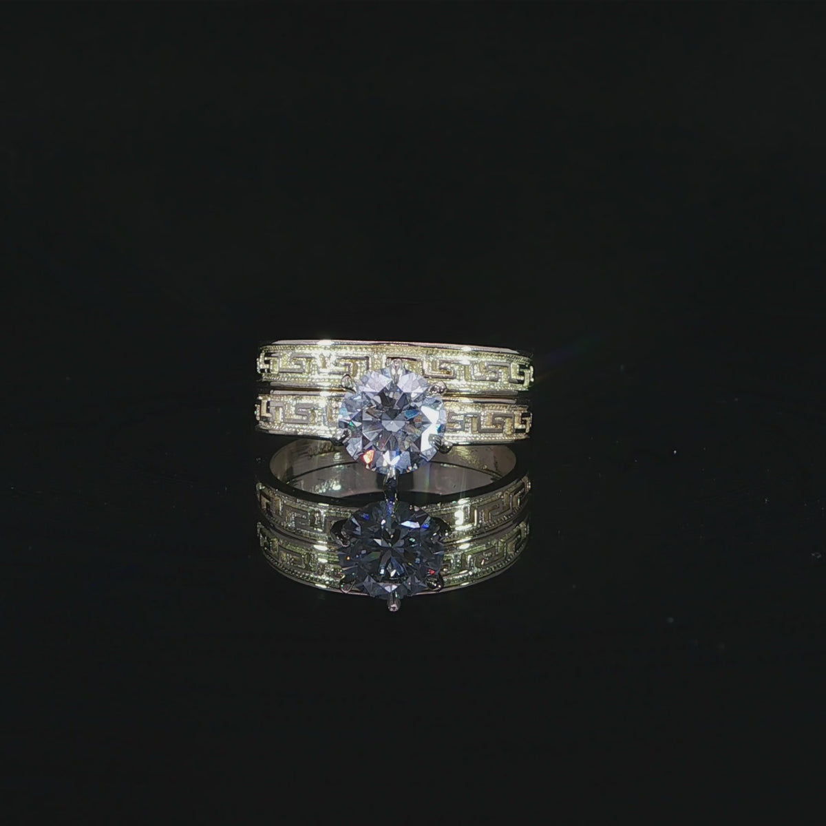 Flat video of a 10K yellow gold bridal set with matching Greek key engraving and a 1.21 CT lab-grown diamond