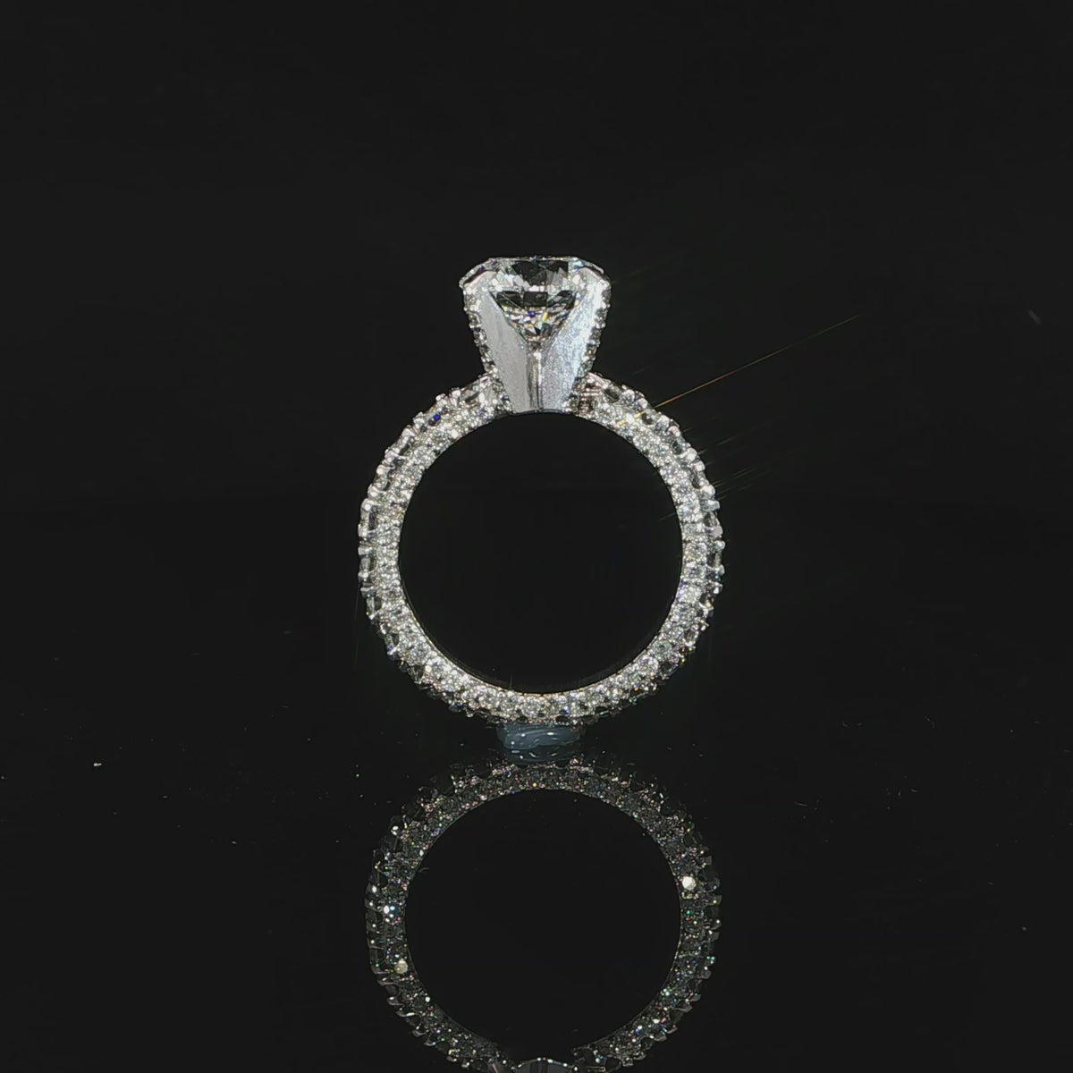 Video showcasing the diamond details on all sides of the engagement ring.