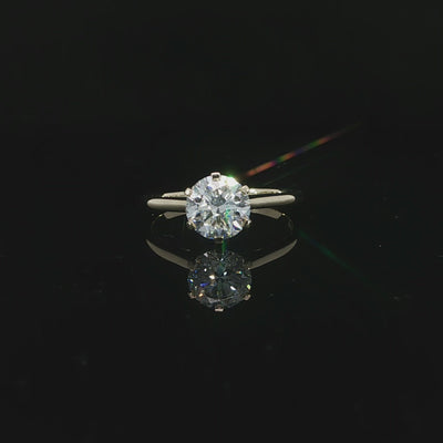 1.50CT lab grown certified diamond with a 6-prong setting in 14K yellow gold
