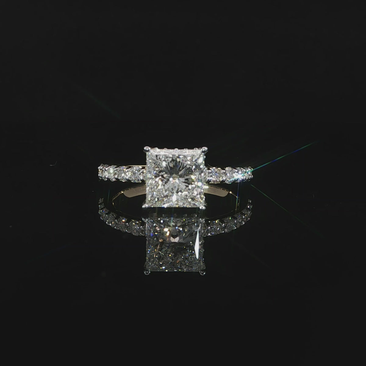 Engagement ring featuring a 2.03 carat E color VS1 princess cut lab grown diamond with pavé accents.