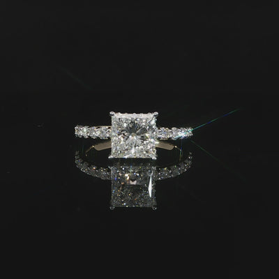 Engagement ring featuring a 2.03 carat E color VS1 princess cut lab grown diamond with pavé accents.