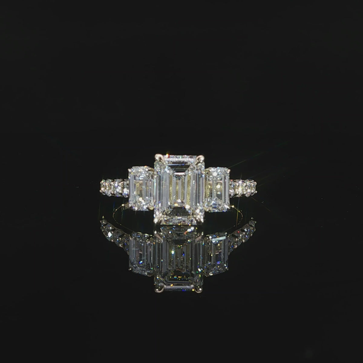 14K yellow gold ring featuring a 2.06 carat F color VS1 emerald cut lab grown center diamond.