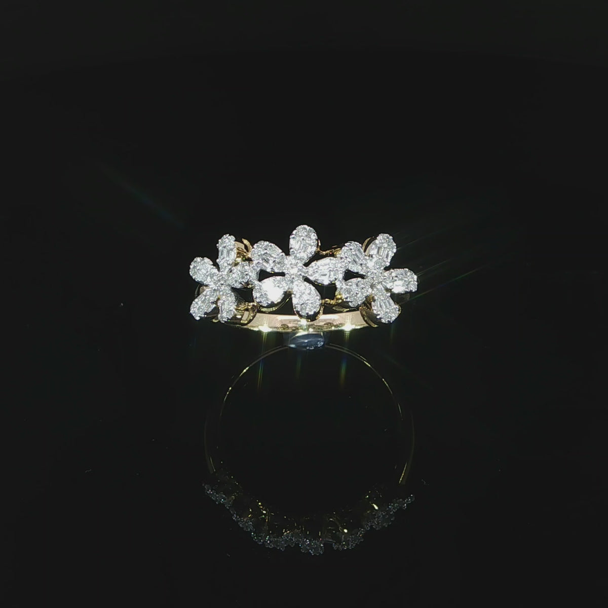 10K gold flower ring with baguette diamond petal detail