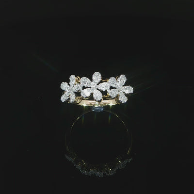 10K gold flower ring with baguette diamond petal detail