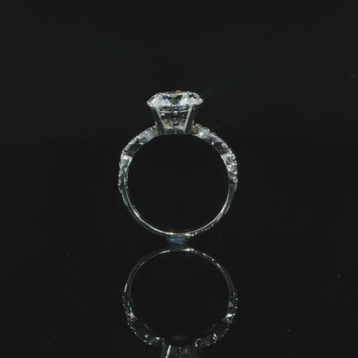 Standing view of a 14K white gold 3.37 CTW lab-grown diamond ring showing the twist shoulders and polished lower band.
