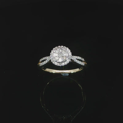 Angled video of a 10K yellow gold 0.40 CTW diamond halo ring with open split shoulders.