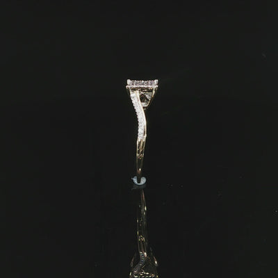 Video of natural diamond ring standing edge-on, with its curved 10K yellow gold band reflected below.