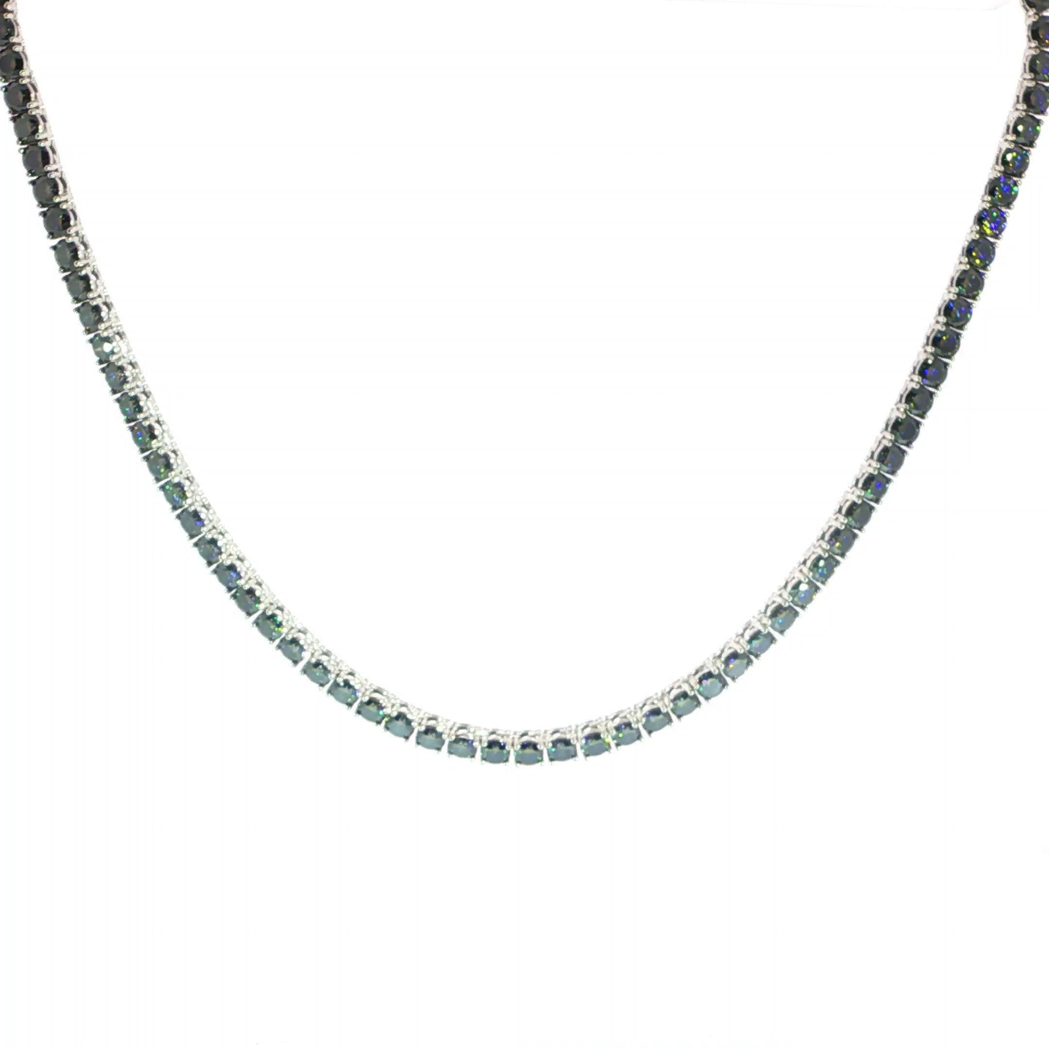 Sterling Silver Blue Moissanite Tennis Necklace With A Sleek 4MM Tennis Chain Design.