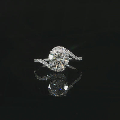 Bypass engagement ring with 2.30 total carats of lab-grown diamonds set in 14K white gold.