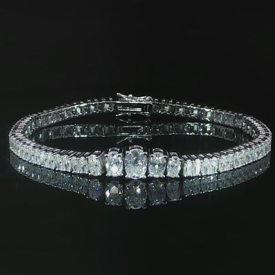 Video of sterling silver luxury graduated oval moissanite tennis bracelet