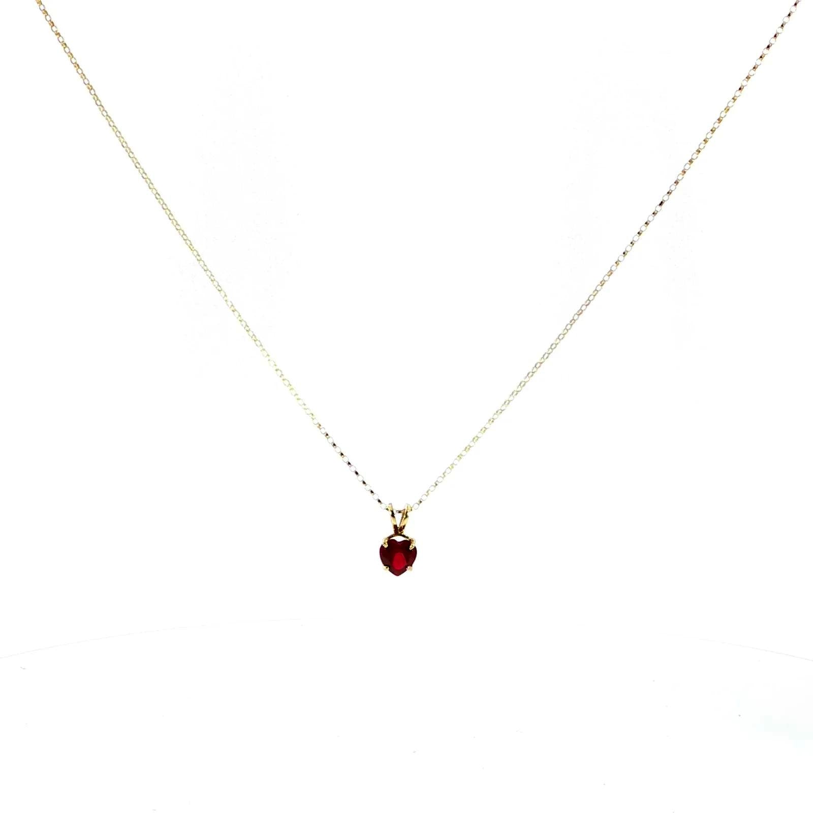 Heart-Shaped Ruby Pendant on a 14K Yellow Gold Adjustable Chain