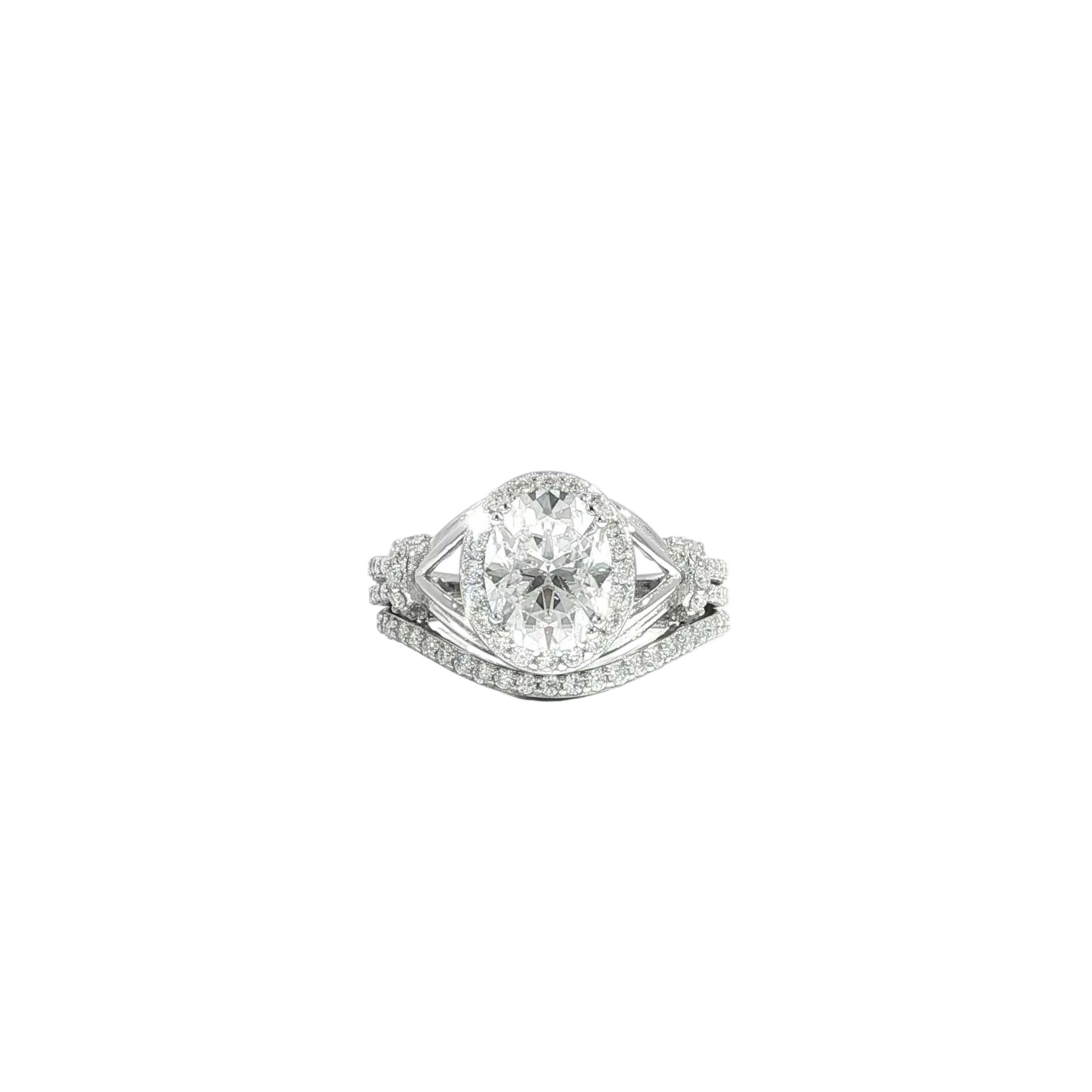 Video of sterling silver bridal set featuring oval moissanite with halo and matching band