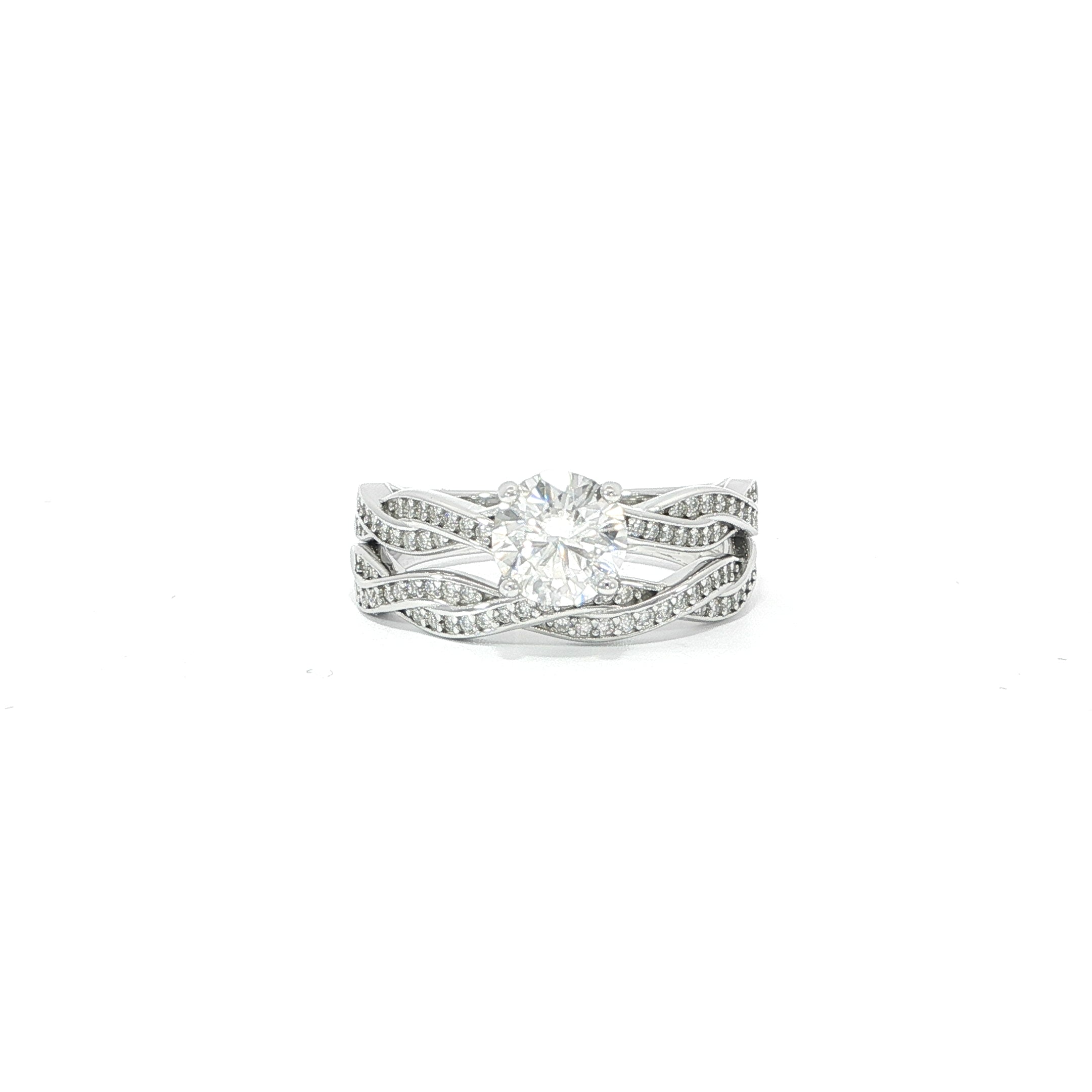 Twisted pavé moissanite engagement ring and matching wedding band
