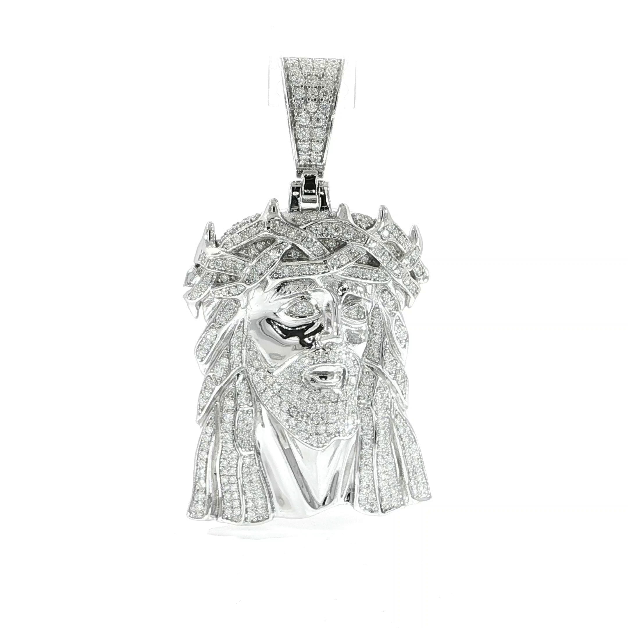 Video of silver jesus head pendant with vvs moissanite
