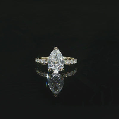 Pear-shaped engagement ring with 2.50 total carats of lab-grown diamonds in 14K yellow gold.