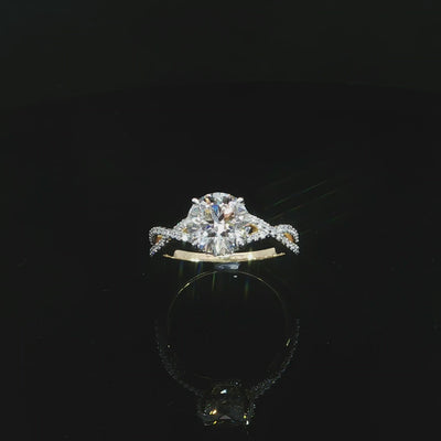 Yellow gold engagement ring featuring an E color, VS1 clarity round lab-grown center diamond.