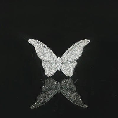 Nature-inspired sterling silver ring featuring a dimensional butterfly with fully spread wings.