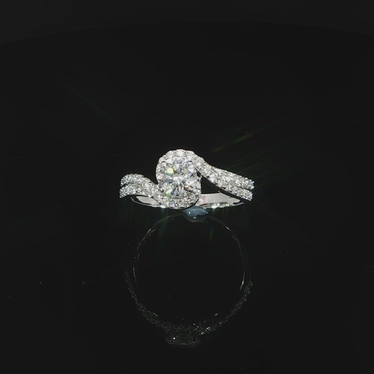 Angled video of 0.97 CTW lab grown diamond ring with a 0.50 carat round center stone in 14K white gold.