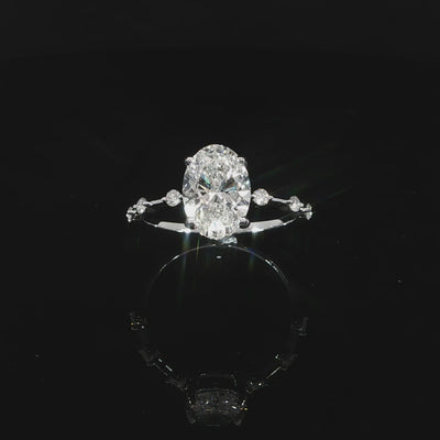 14K gold oval ring with subtle diamond station detailing
