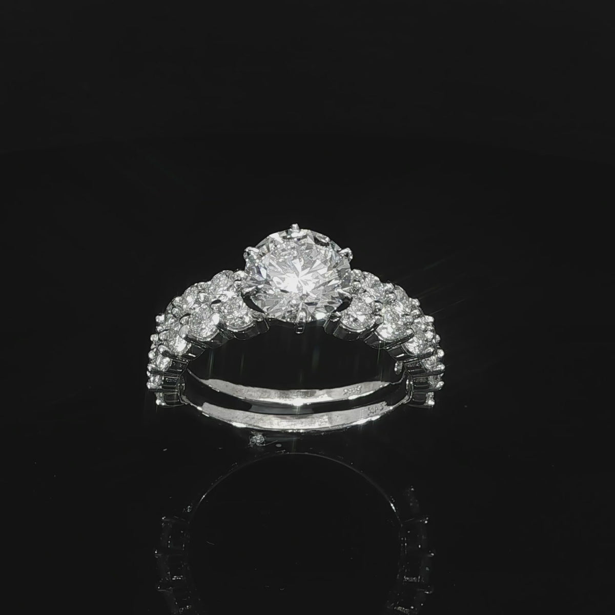 Half-eternity diamond engagement ring in polished white gold