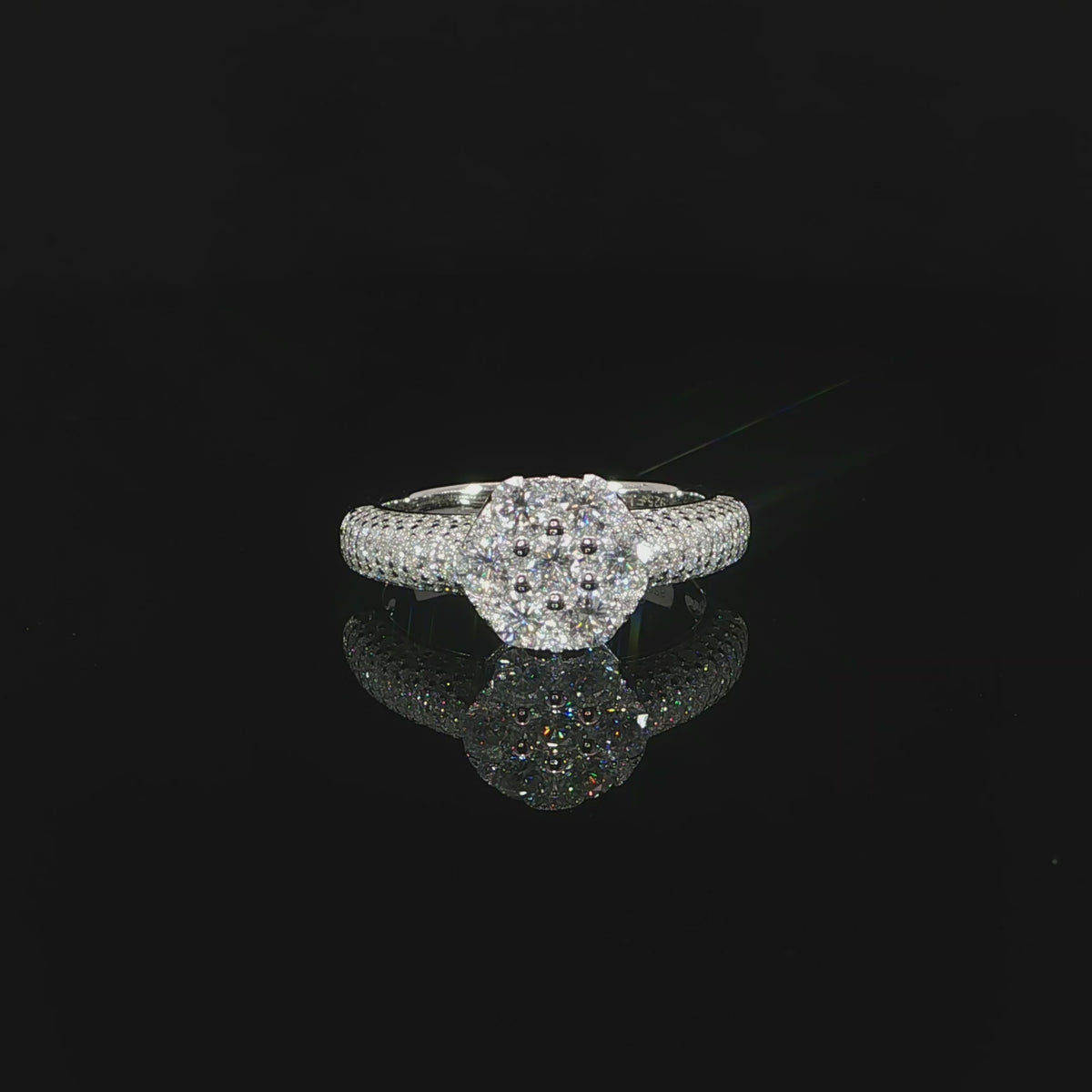 Sterling silver cluster ring set with 1.59 total carats of VVS moissanite.