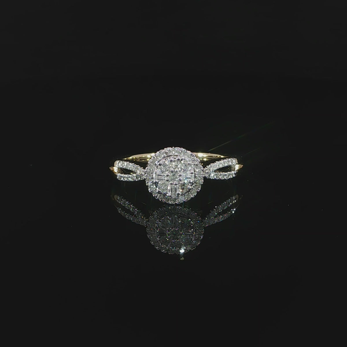 10K yellow gold 0.40 CTW natural diamond ring showing the central cluster, halo and diamond shoulders.