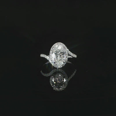 Video of oval halo engagement ring with 2.41 total carats of lab-grown diamonds in 14K white gold.
