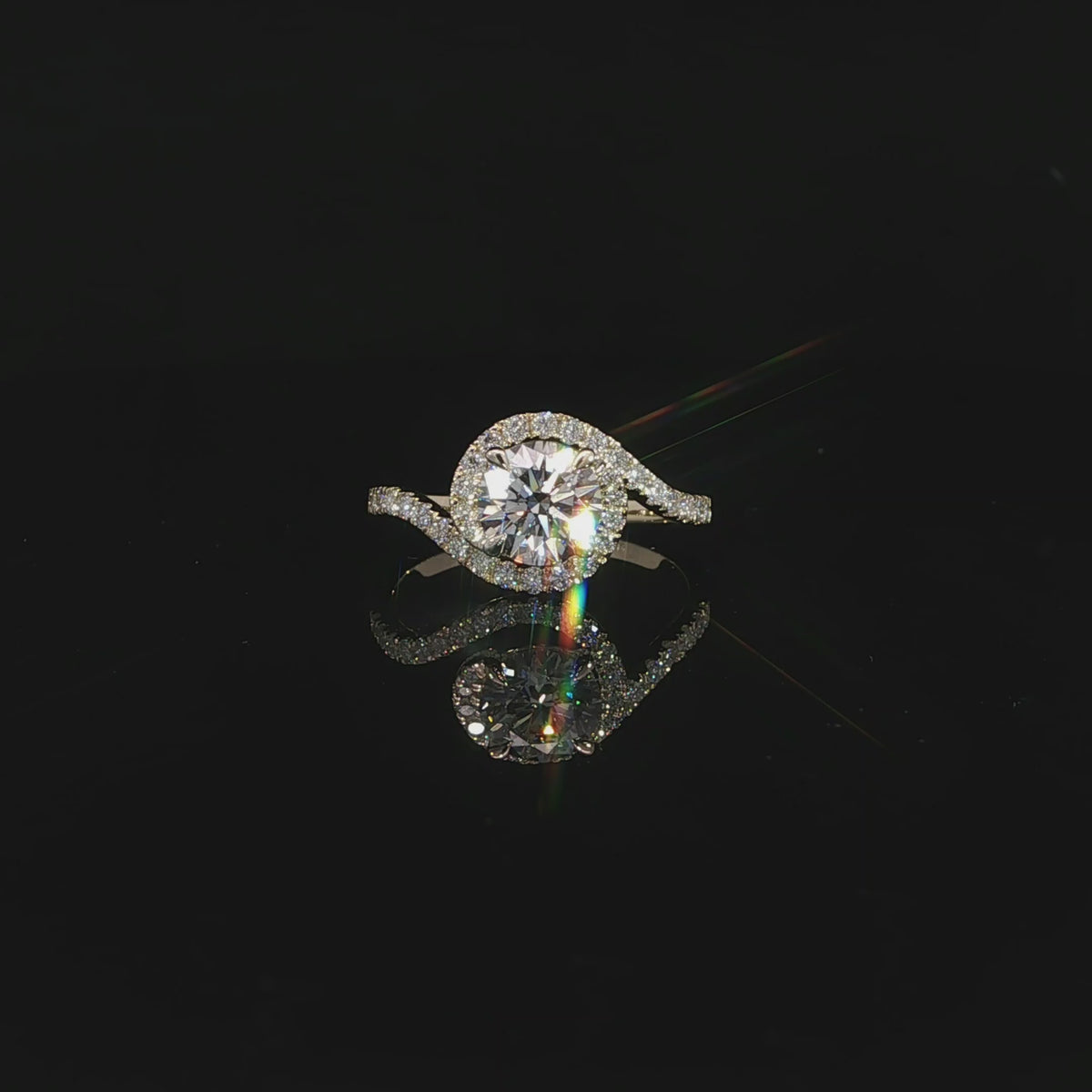 Video of 14K yellow gold round diamond bypass ring with 1.38 carats total diamond weight