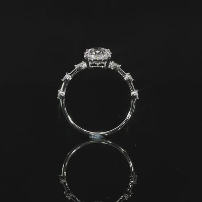 Detailed video of the setting supporting the 2-carat oval center diamond.