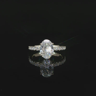 Video of oval engagement ring with 2.59 total carats of lab-grown diamonds in 14K yellow gold.