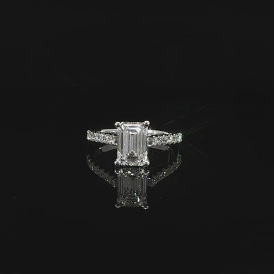 14K white gold engagement ring featuring a 2.08 carat G color VS1 emerald cut lab grown diamond.