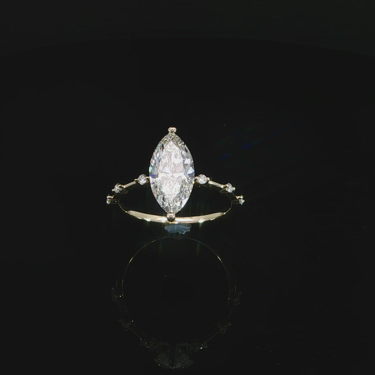 IGI certified marquise diamond engagement ring with delicate station band