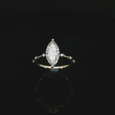 IGI certified marquise diamond engagement ring with delicate station band