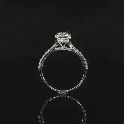 Close-up of the gallery, prongs and hidden halo around the radiant diamond.