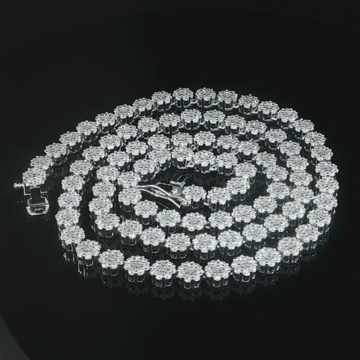 Top down view of a round moissanite cluster tennis chain