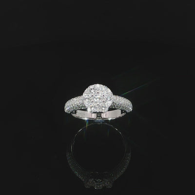 Nine-millimeter-wide round cluster ring in 925 sterling silver with VVS moissanite.