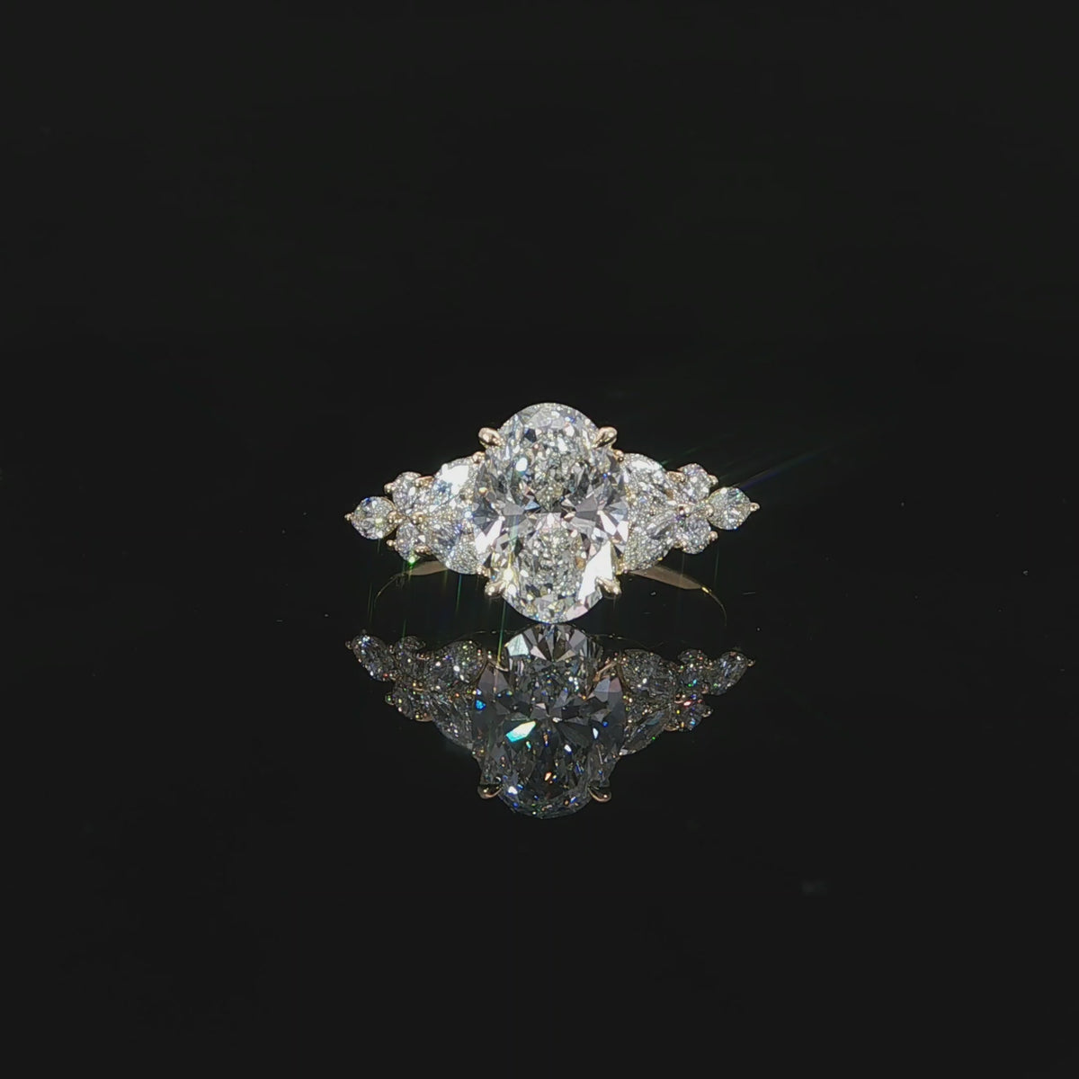 2.52 CTW oval lab grown diamond engagement ring crafted in 14K yellow gold.