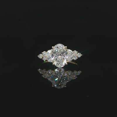 2.52 CTW oval lab grown diamond engagement ring crafted in 14K yellow gold.