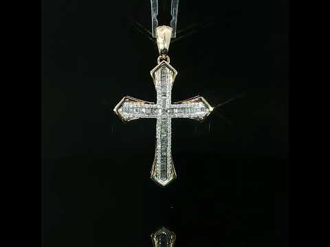 Channel-set baguette diamonds trace the arms of a yellow gold cross framed by a round diamond halo.