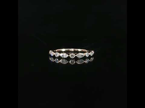 Close-up video of 14K rose gold diamond band
