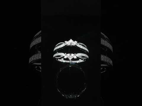 White gold floral ring enhancer showing diamond-set bands and polished looping accents