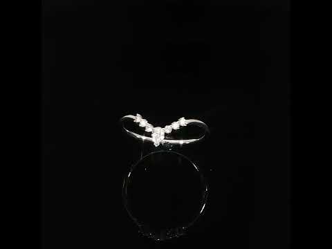 White gold diamond contour wedding band featuring a V-shaped silhouette accented with brilliant lab grown diamonds and a teardrop-inspired center cluster.