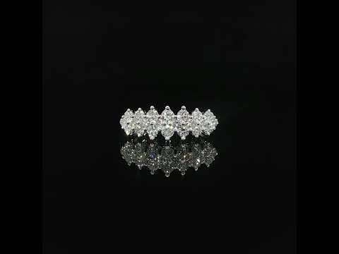 Front detail of a 1.02 CTW lab-grown diamond band with staggered stones and visible gold prongs.