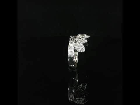 Marquise and baguette diamond crown ring in 14K white gold on a reflective black surface.
