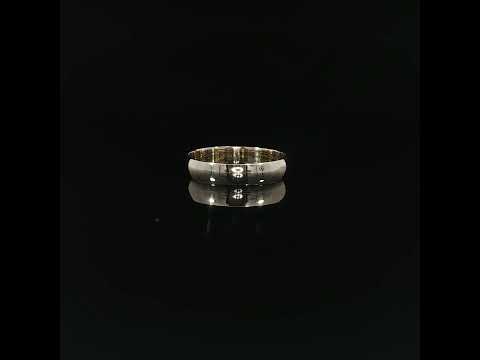 Classic 14K solid gold plain wedding band displayed against a glossy black background, emphasizing its 4mm width and smooth, mirror-polished finish.