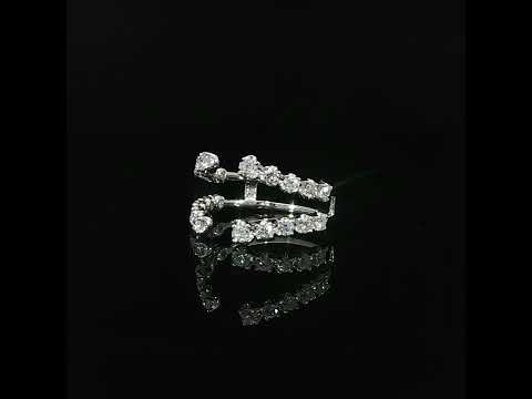 White gold diamond enhancer showing parallel bands, an open center channel and larger round diamonds at each tip.