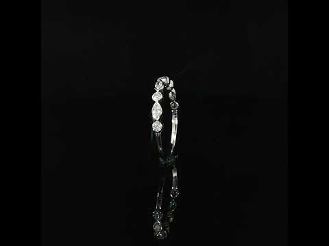 Upright lab-grown diamond band showing smooth white gold bezel walls above a narrow polished shank.