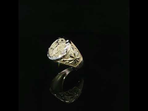 14K yellow gold Centenario-inspired signet ring with a winged figure and faceted white accent border.