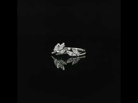 Curved leaf ring in 14K white gold with 0.06 CTW of lab-grown diamonds, shown on a reflective black surface.