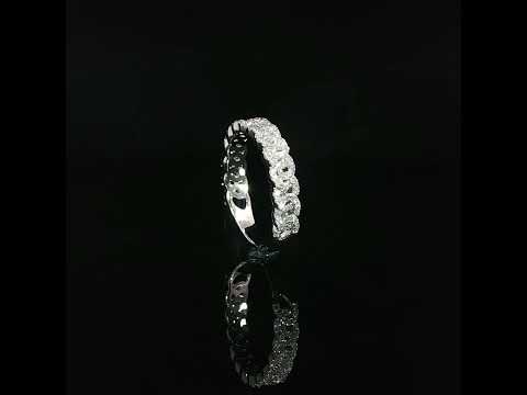 Interlocking link motifs traced with pavé diamonds across the top of a polished 14K white gold band.
